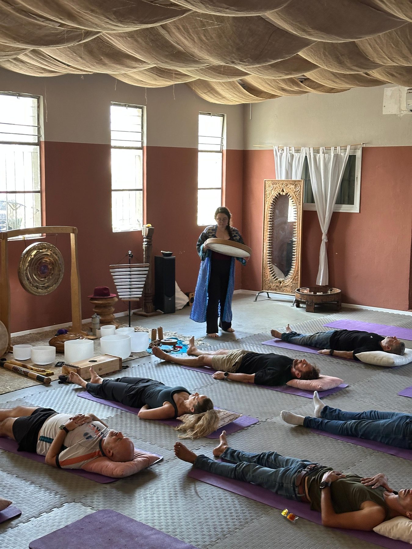 Ashley guiding a group through a private session